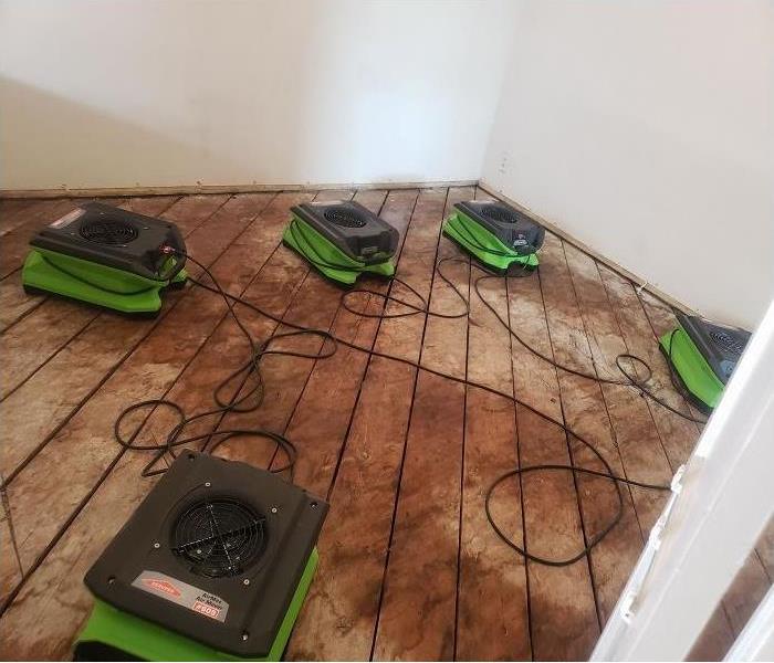 Our equipment will get the job done! - Image of air movers in room.